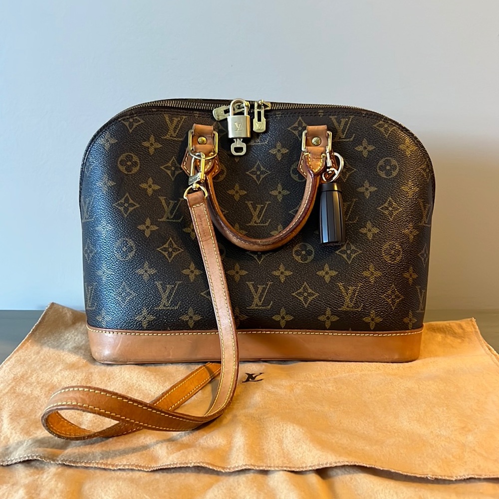 Louis Vuitton Alma with Strap, Padlock and Dustbag